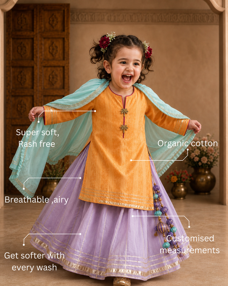 Girl wearing Anaario Orange Palm Lehenga Set