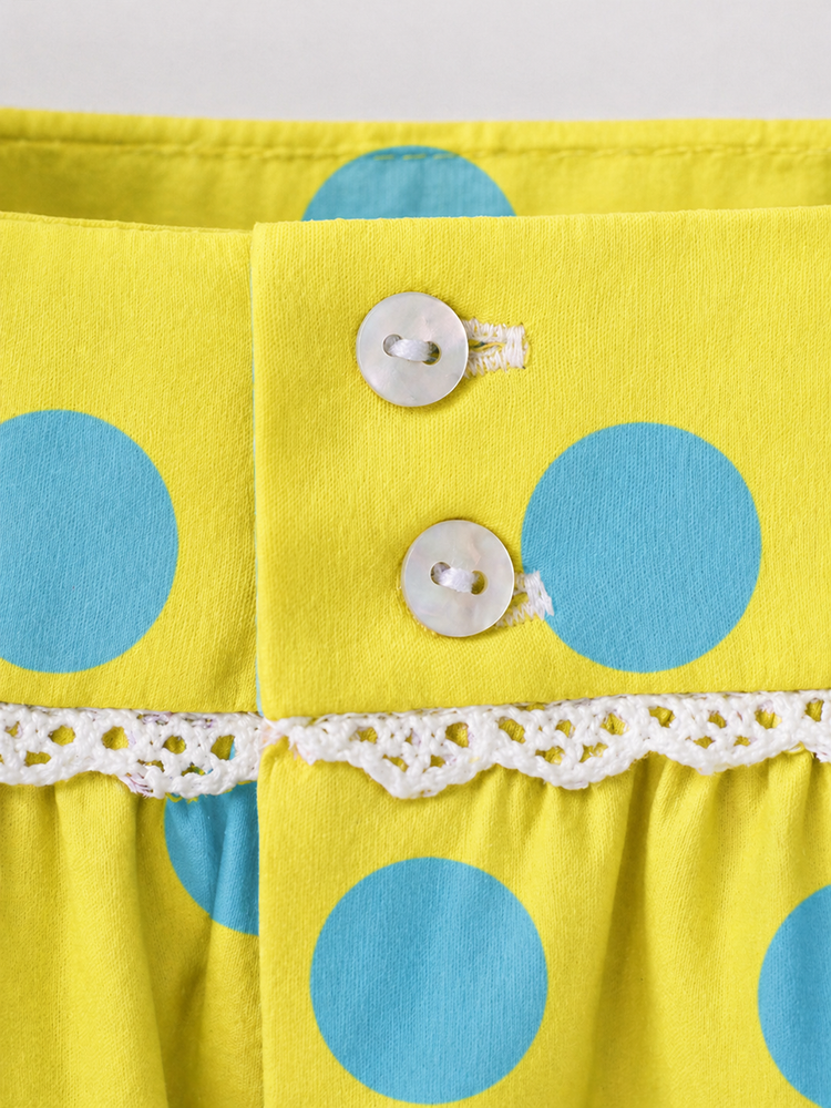 Baby wearing Anaario Lime Polka Dot Puff Sleeve lime green with white polka dots dress set, newborn to 24 months