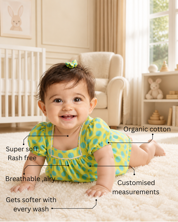 Baby wearing Anaario Lime Polka Dot Puff Sleeve lime green with white polka dots dress set, newborn to 24 months