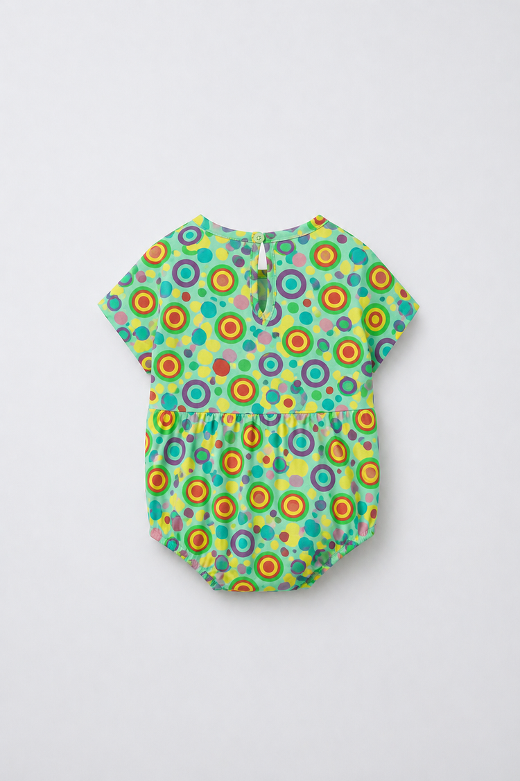 Baby wearing Anaario Multicolour Circle Print Bubble mint base romper, newborn to 24 months