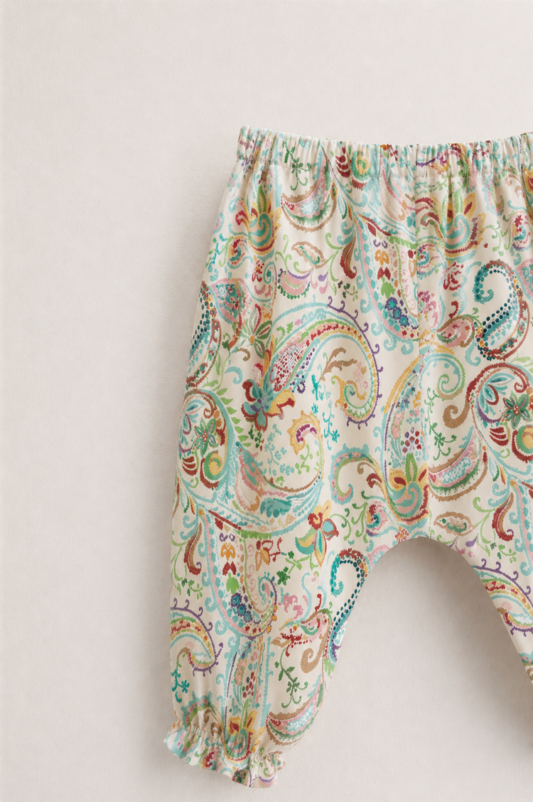 Baby wearing Anaario Pastel Paisley Wrap soft pastel paisley print co-ord set, newborn to 24 months
