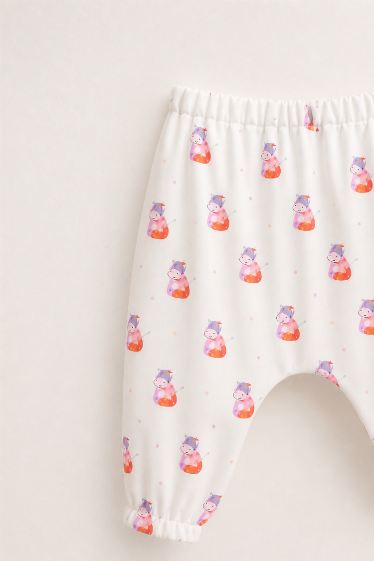 Baby wearing Anaario Pink Cow organic mulmul cotton set, newborn to 24 months