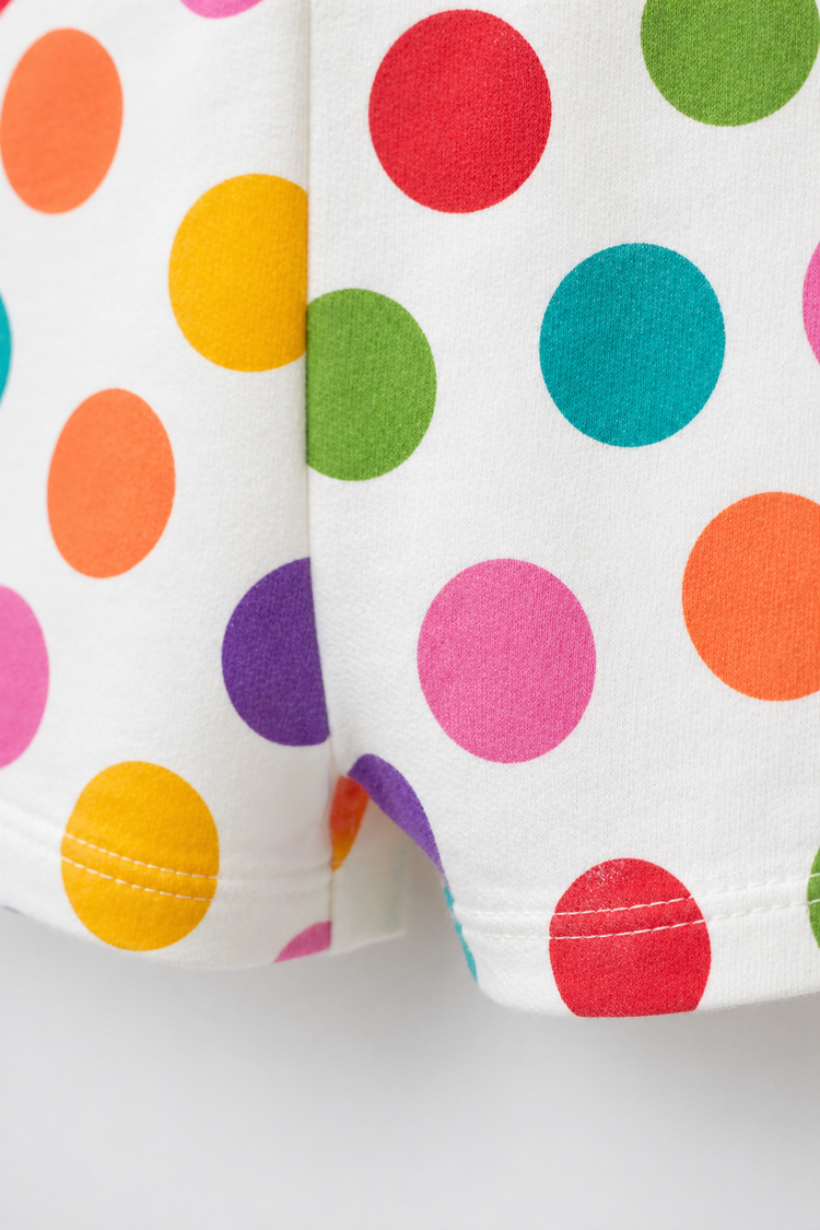 Baby wearing Anaario Rainbow Dot Pleated white with multicolour polka dots romper set, newborn to 24 months