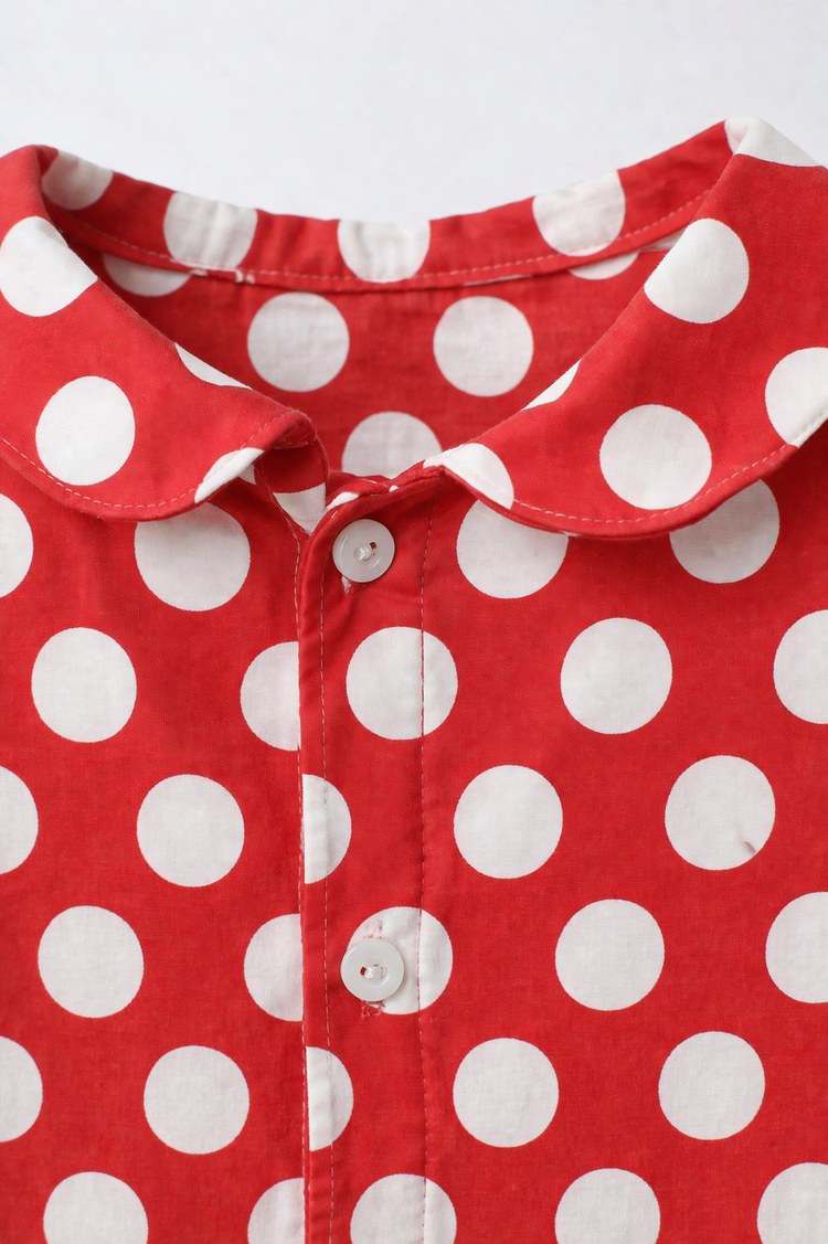 Baby wearing Anaario Crimson Dot Collared red with white polka dots romper with Peter Pan collar, newborn to 24 months