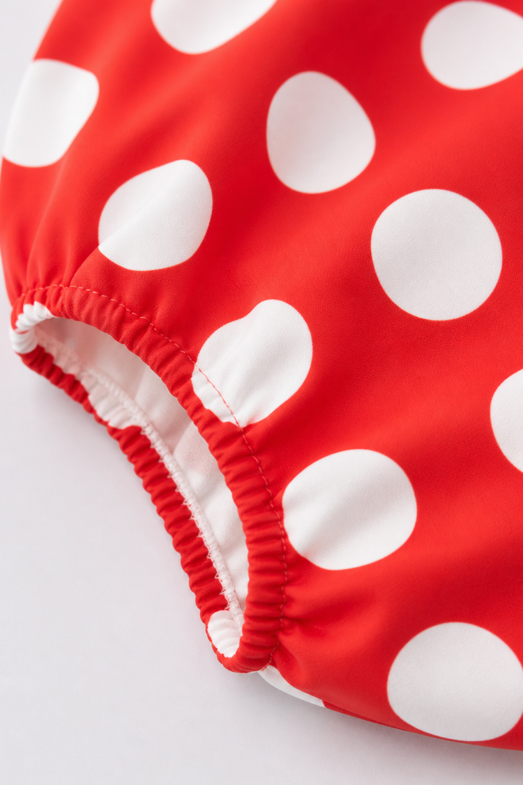 Baby wearing Anaario Crimson Dot Collared red with white polka dots romper with Peter Pan collar, newborn to 24 months
