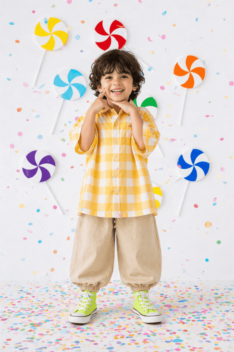 Boy wearing Anaario Butter Check Balloon Co-ord Set, yellow check shirt with matching balloon-style pant