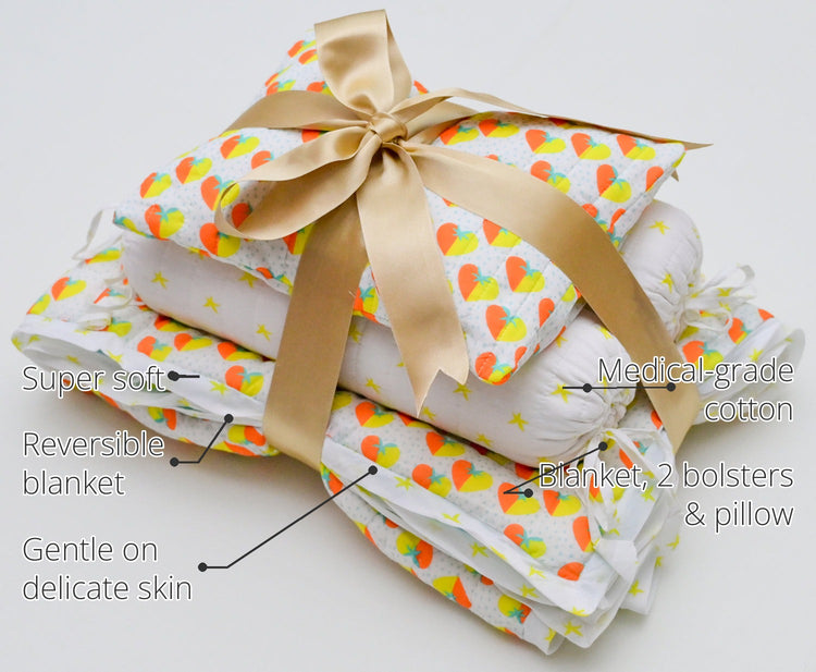 Snuggles and Cuddles Baby Blanket Gift Bundle (Orange and yellow hearts) features