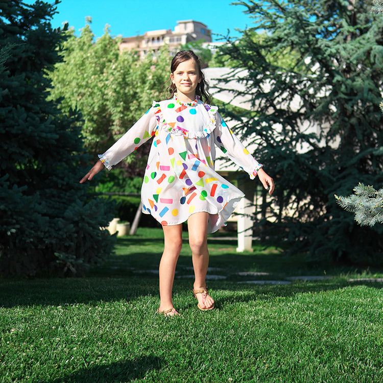 Girl wearing Anaario Confetti Party Dress