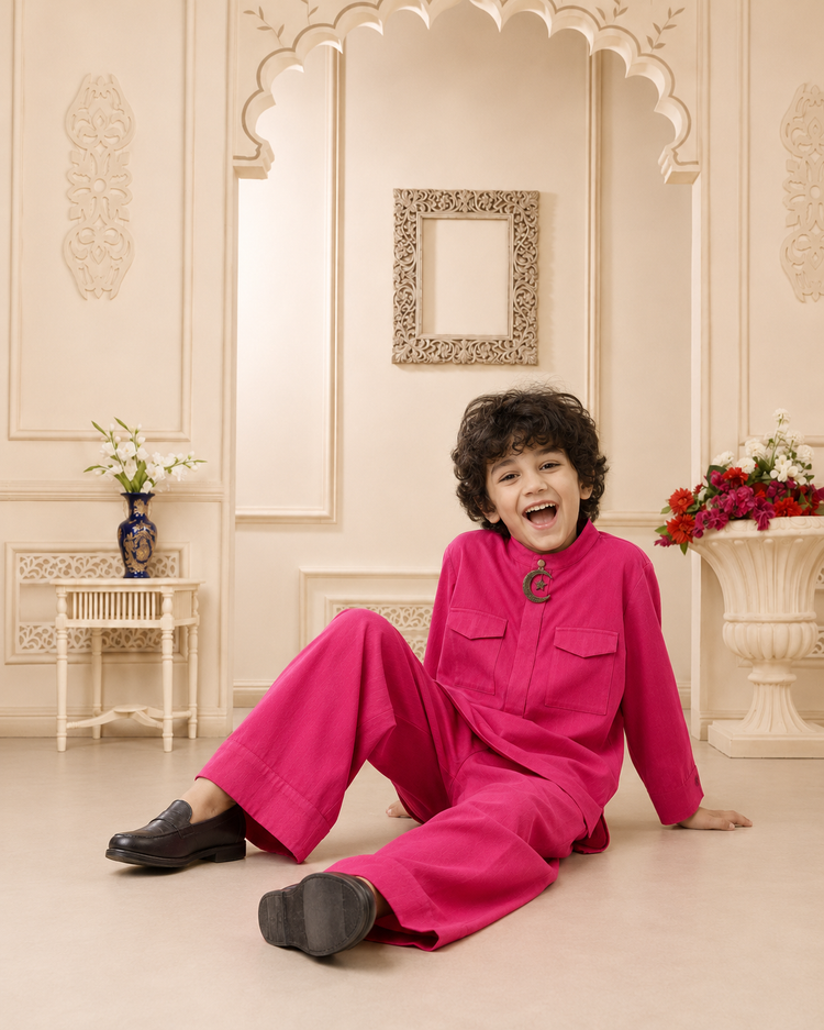 Fuchsia Moon-Star Kurta Set - boy sitting under arch