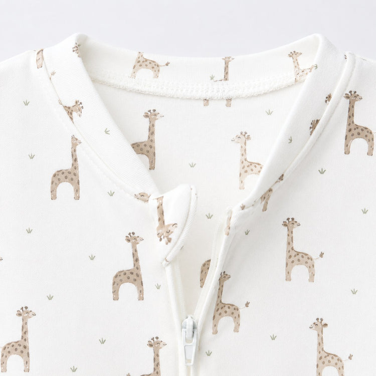 Giraffe bamboo cotton baby sleepsuit — bamboo cotton onesie romper flatlay