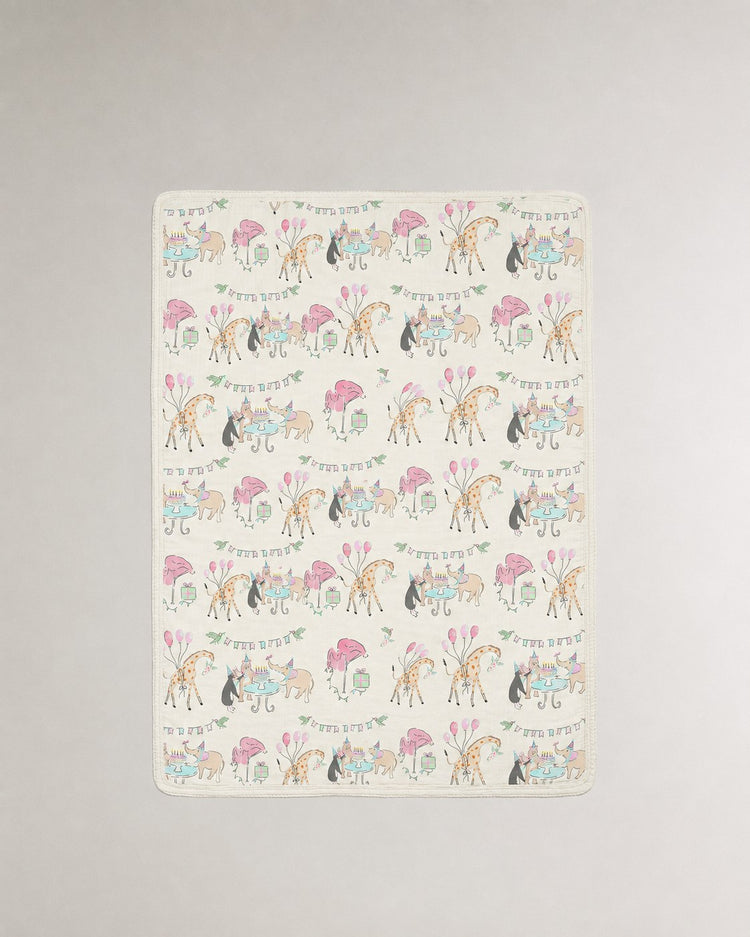 Giraffe Birthday Party bamboo baby quilt — soft bamboo cotton flatlay