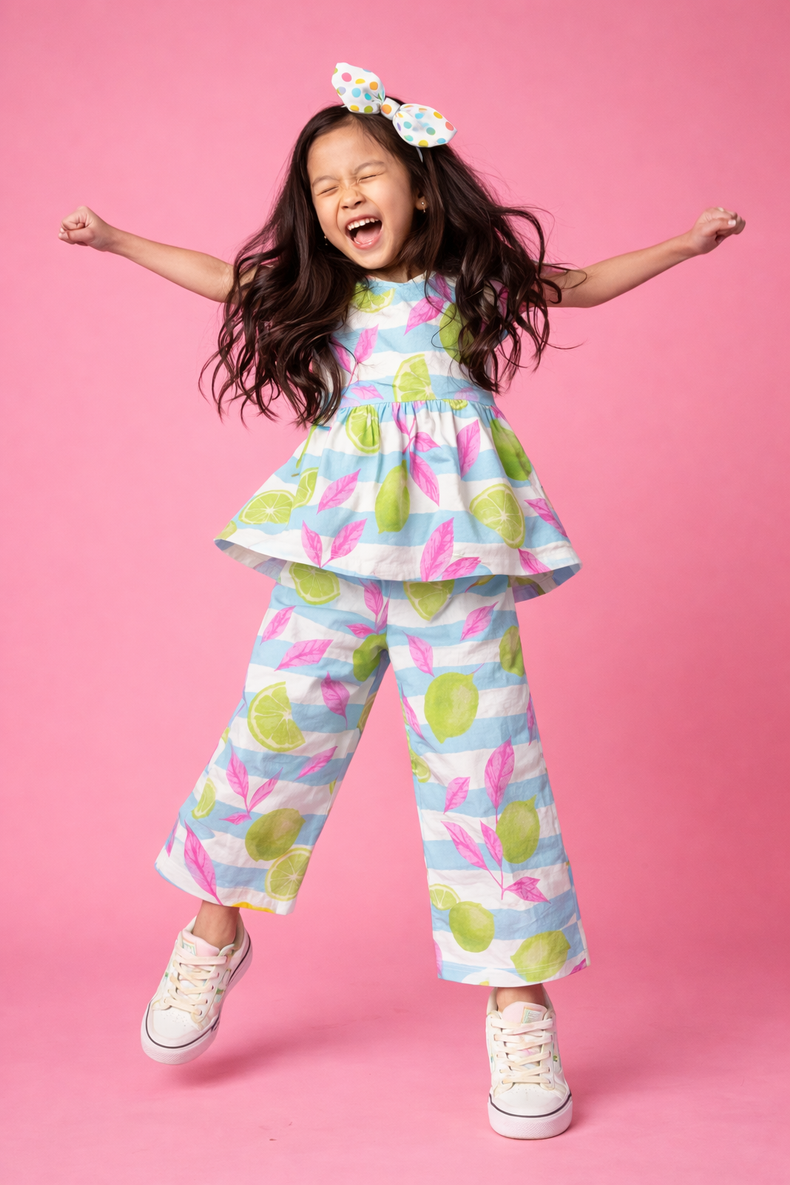 Girl wearing Anaario Neon Limes and Leaves Co-ord Set
