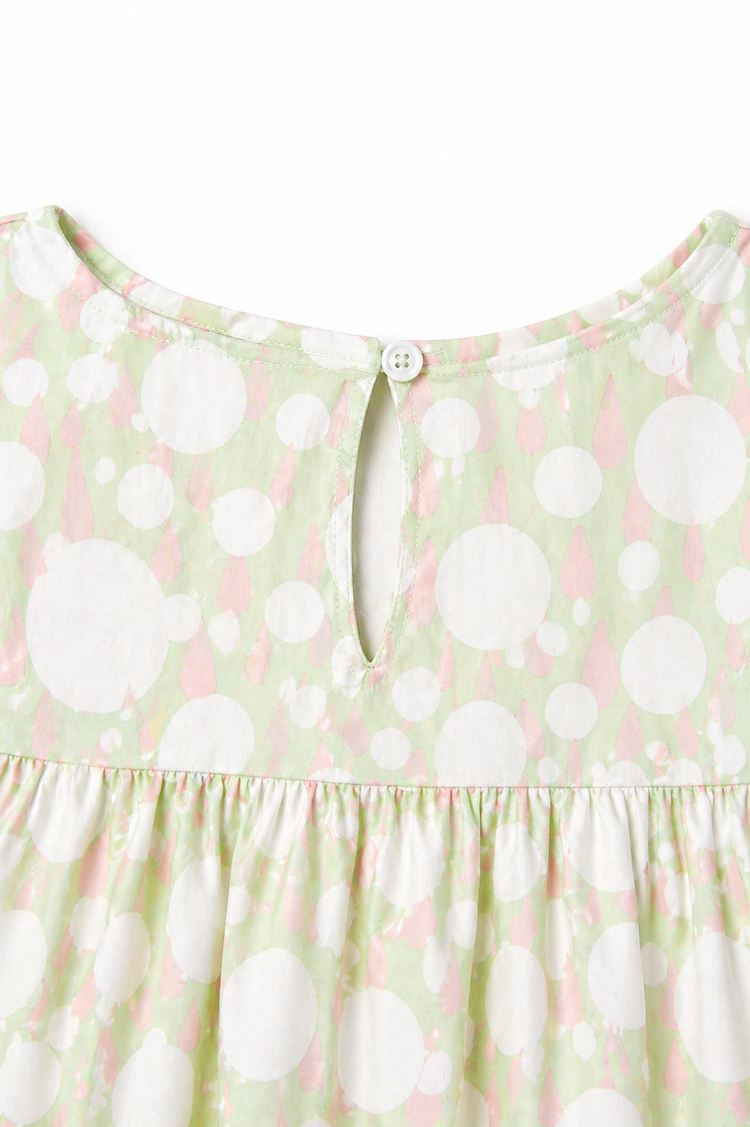 Girl wearing Anaario Ivory and Rose Poppy Raindrops Night Suit