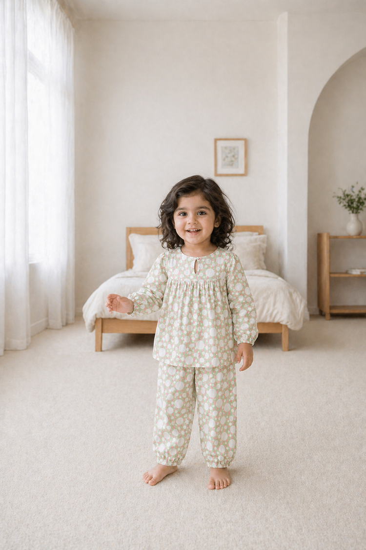 Girl wearing Anaario Ivory and Rose Poppy Raindrops Night Suit