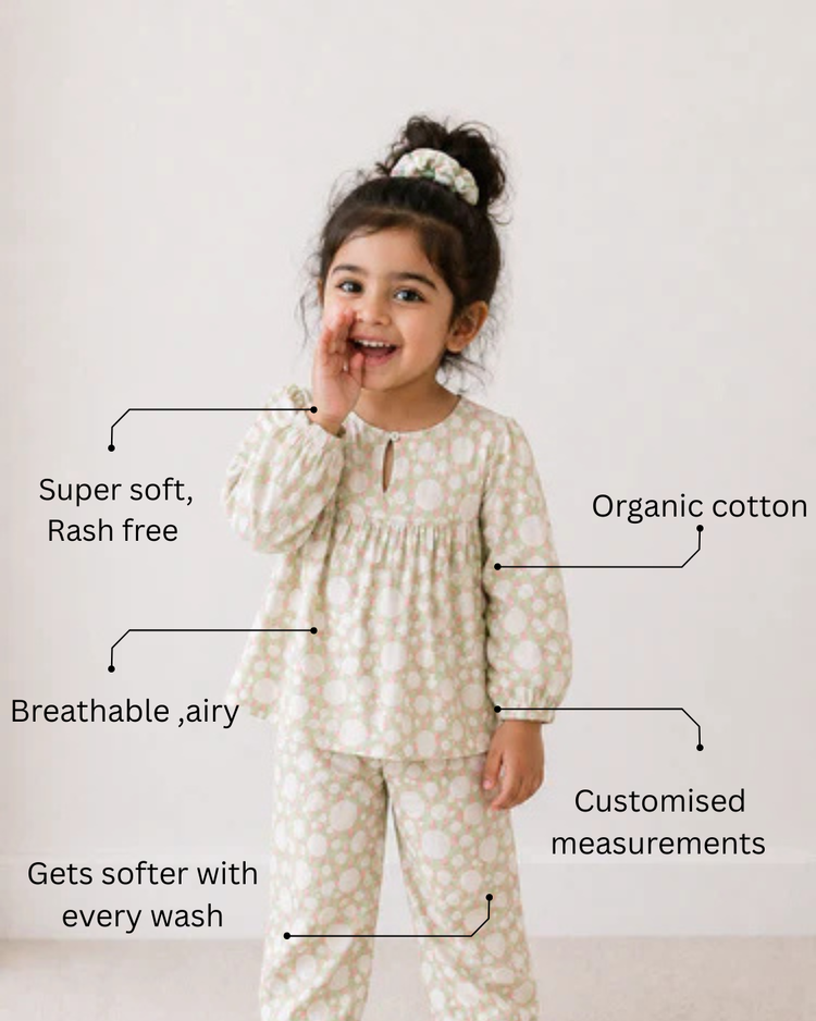 Girl wearing Anaario Ivory and Rose Poppy Raindrops Night Suit