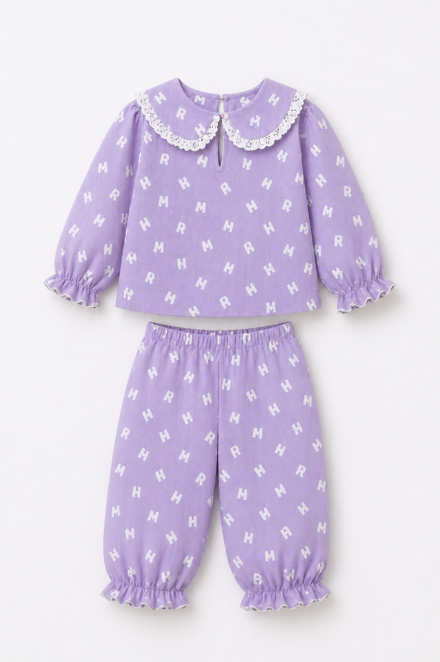 Girl wearing Anaario Purple Alphabet Night Suit