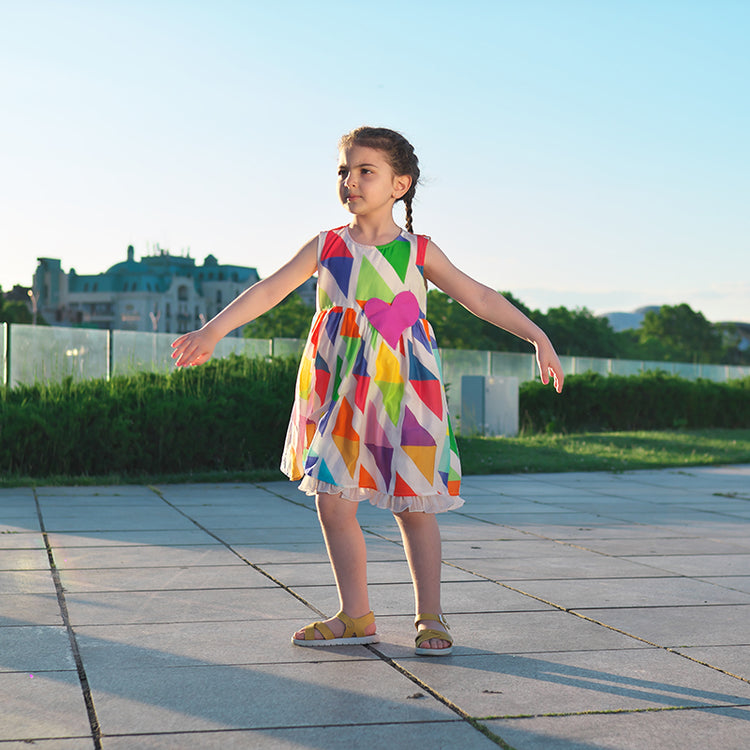 Girl wearing Anaario Rainbow Prism Dress