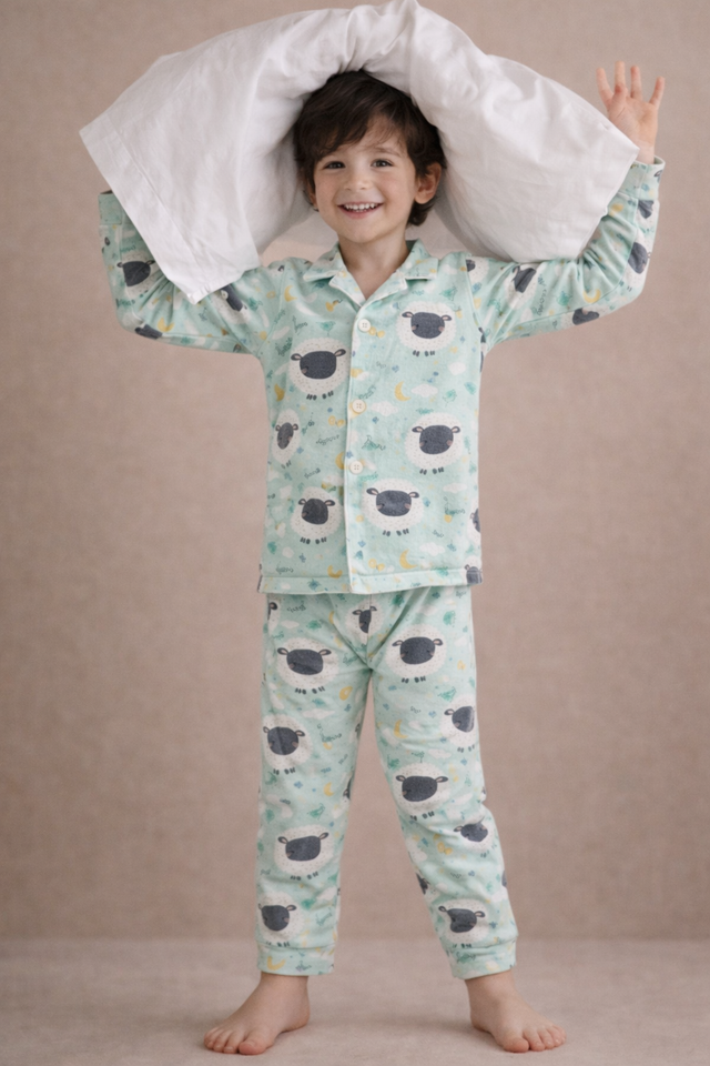 Boy wearing Anaario Sheep and Night Sky Night Suit