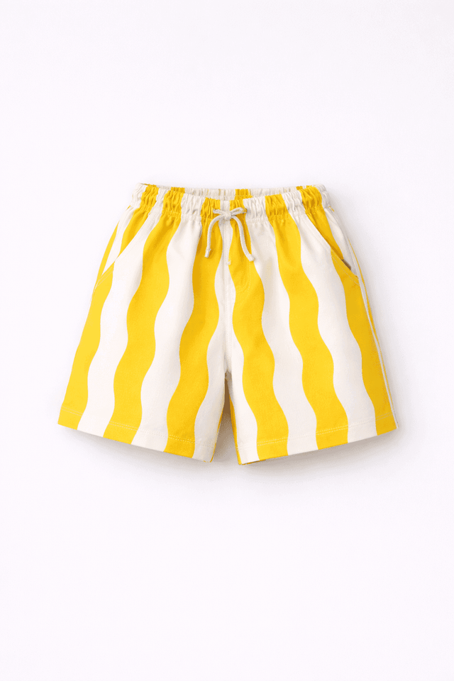 Boy wearing Anaario Sunwave Pocket Shirt Set, white pocket shirt with matching yellow wavy-striped shorts