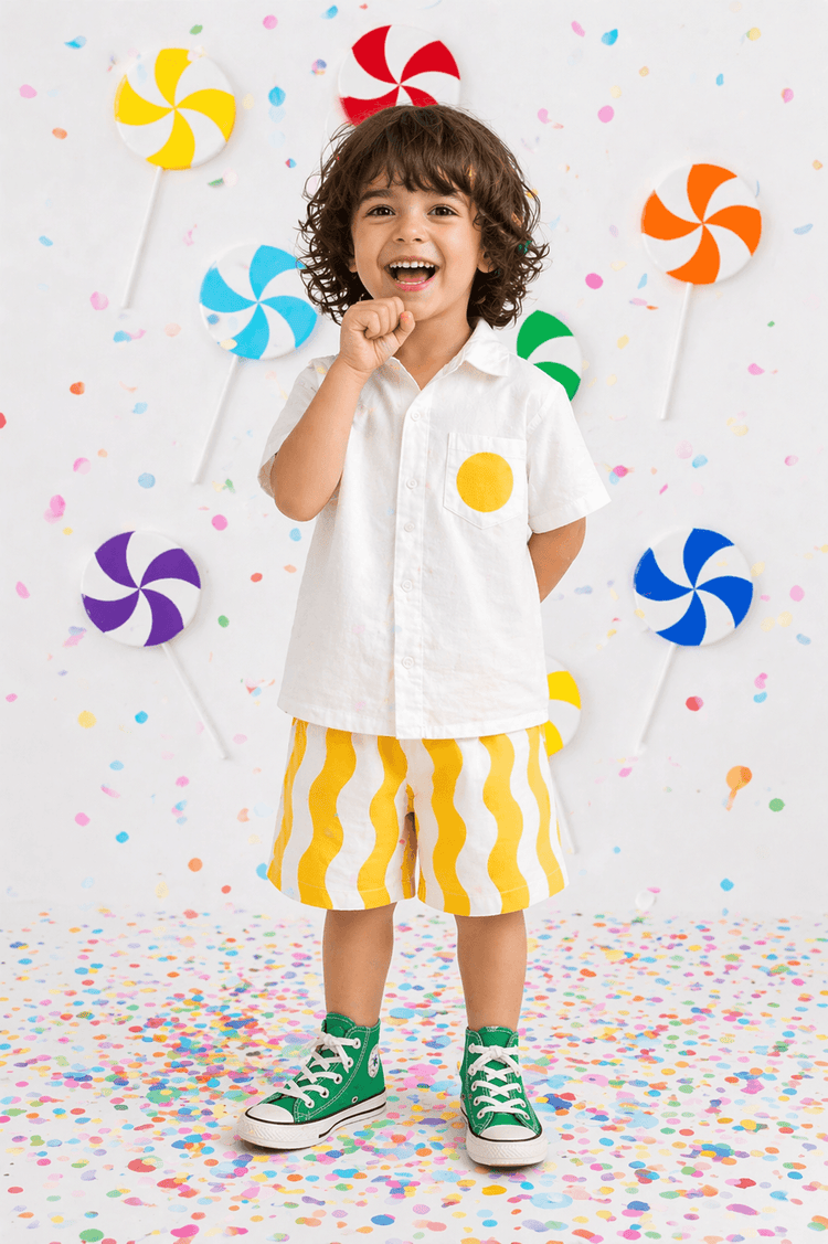 Boy wearing Anaario Sunwave Pocket Shirt Set, white pocket shirt with matching yellow wavy-striped shorts
