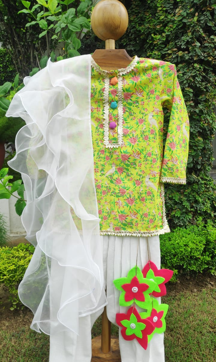 Girl wearing Anaario Lime-Poppy Patiala Set, lime yellow floral print kurta with white patiala pants and cream dupatta