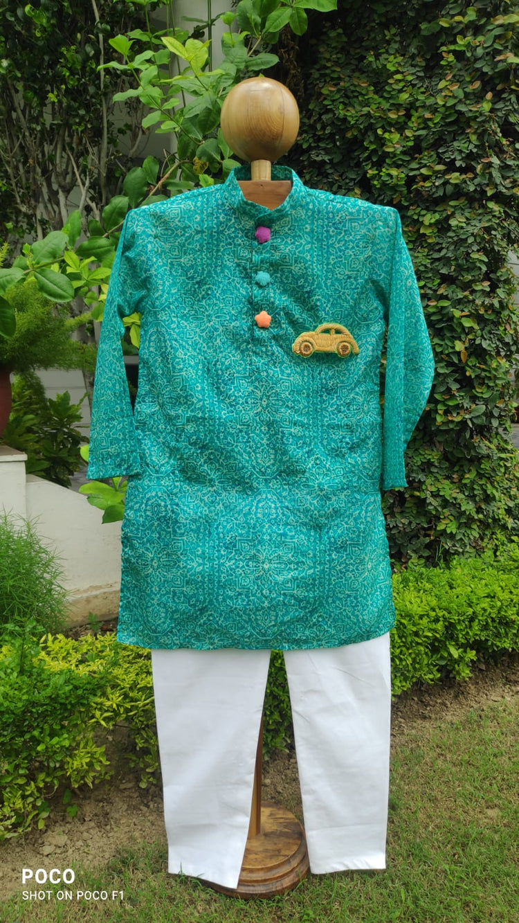 Boy wearing Anaario Turquoise Toy-Pocket Kurta Set, turquoise damask print kurta with car toy-pocket applique