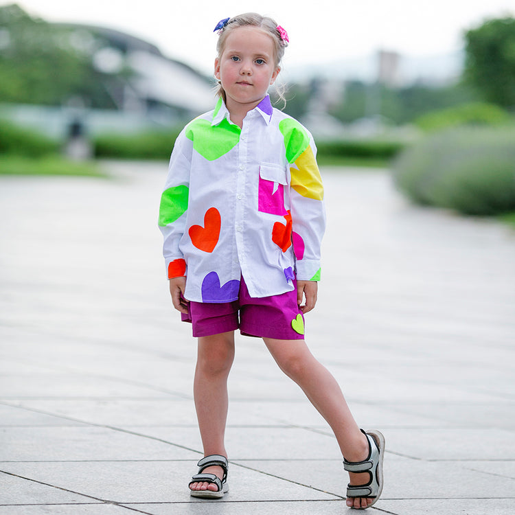 Girl wearing Anaario Ray of Sunshine Shirt