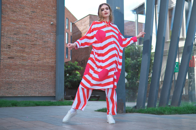 Woman wearing Anaario Sweet Serenade Co-ord Set, red and white striped shirt and matching pants