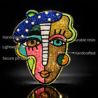 Picasso Brooch features