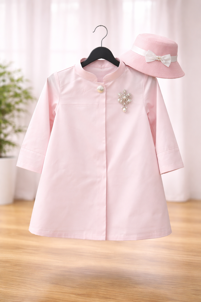Anaario Park Avenue Princess Coat Set detail — pink coat with pearl brooch
