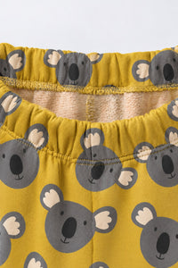 Mustard Koala Jogger Set flat lay by Anaario
