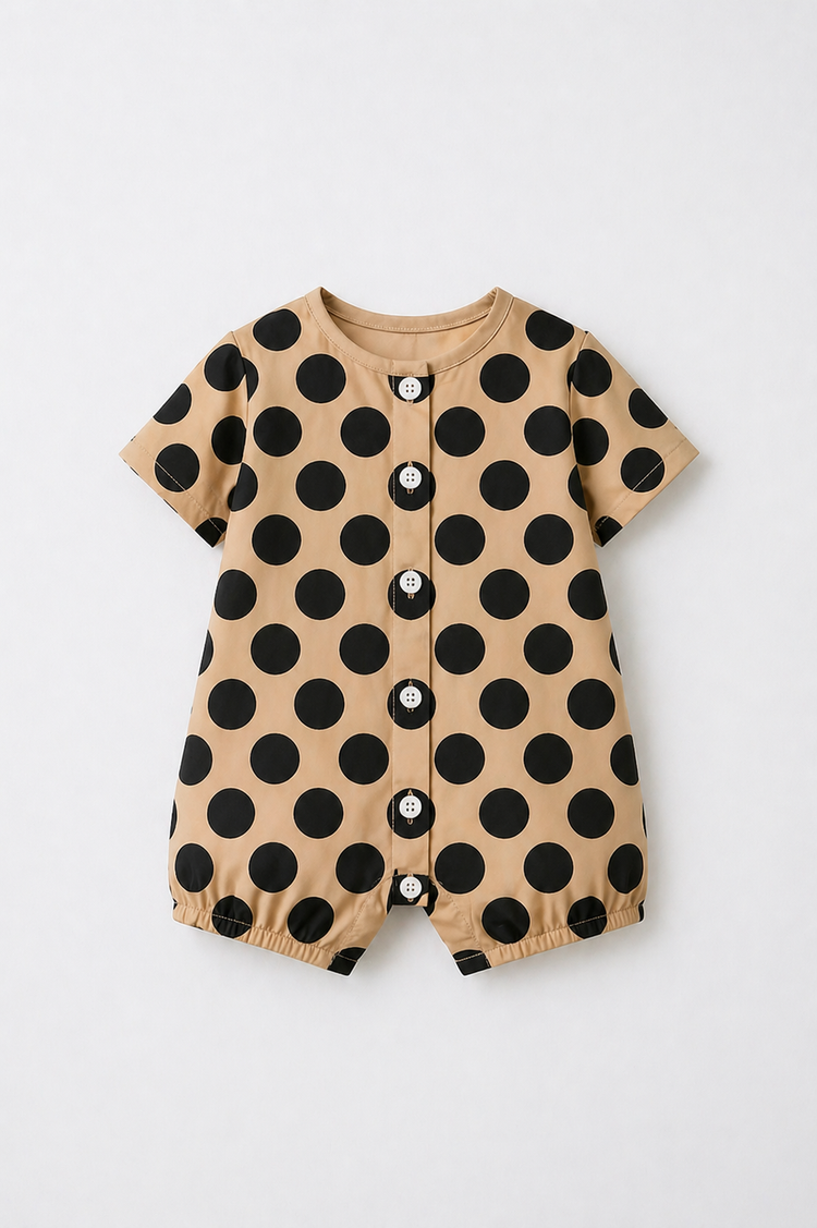 Baby wearing Anaario Beige Black Polka Dot Button short-sleeve romper, newborn to 24 months