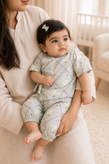 Baby wearing Anaario Blue Goose soft blue with goose and lattice prints co-ord set, newborn to 24 months