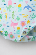 Baby wearing Anaario Sea Friends Pinafore light blue with ocean animals and sea-life prints romper, newborn to 24 months