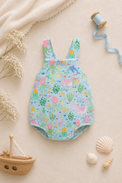 Baby wearing Anaario Sea Friends Pinafore light blue with ocean animals and sea-life prints romper, newborn to 24 months