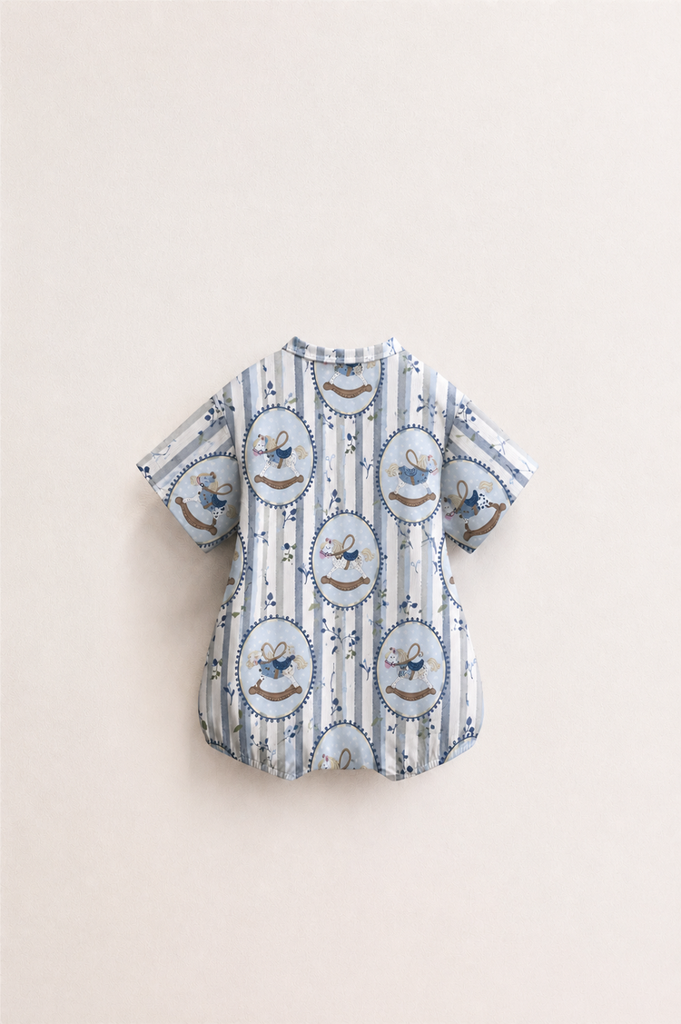 Baby wearing Anaario Blue Rocking Horse Wrap blue stripes with rocking horse prints romper, newborn to 24 months