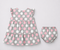 Baby wearing Anaario Blush Dot Tiered grey with pink and white polka dots tiered dress set, newborn to 24 months