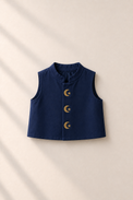 Baby wearing Anaario cream and navy moon-star jacket kurta set