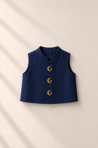 Baby wearing Anaario cream and navy moon-star jacket kurta set