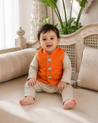 Baby wearing Anaario Cream Bird Motif Jacket Kurta Set, cream kurta with orange bird-embroidered jacket, newborn to 24 months