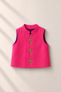 Baby wearing Anaario cream and pink flamingo jacket kurta set