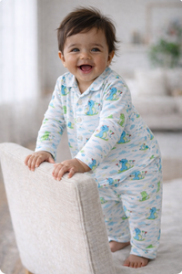 Baby wearing Anaario Dino-Kites organic mulmul cotton set, newborn to 24 months