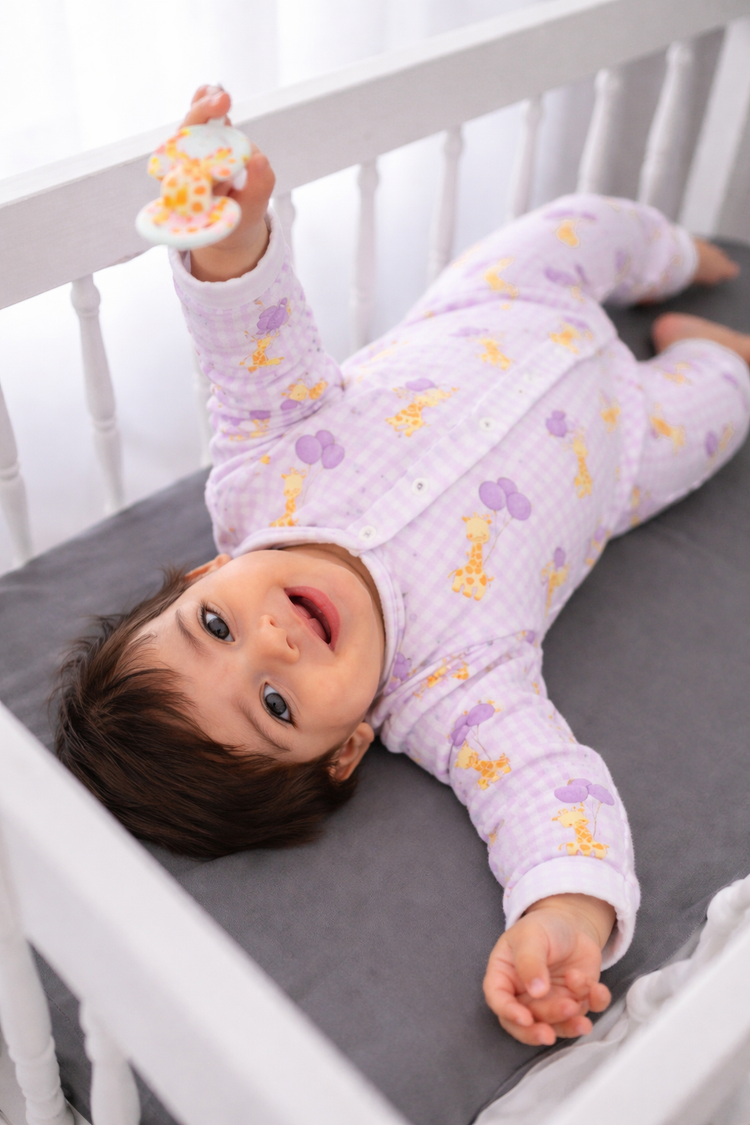 Baby wearing Anaario Giraffe and Balloons organic mulmul cotton Blossom Breeze set, newborn to 24 months