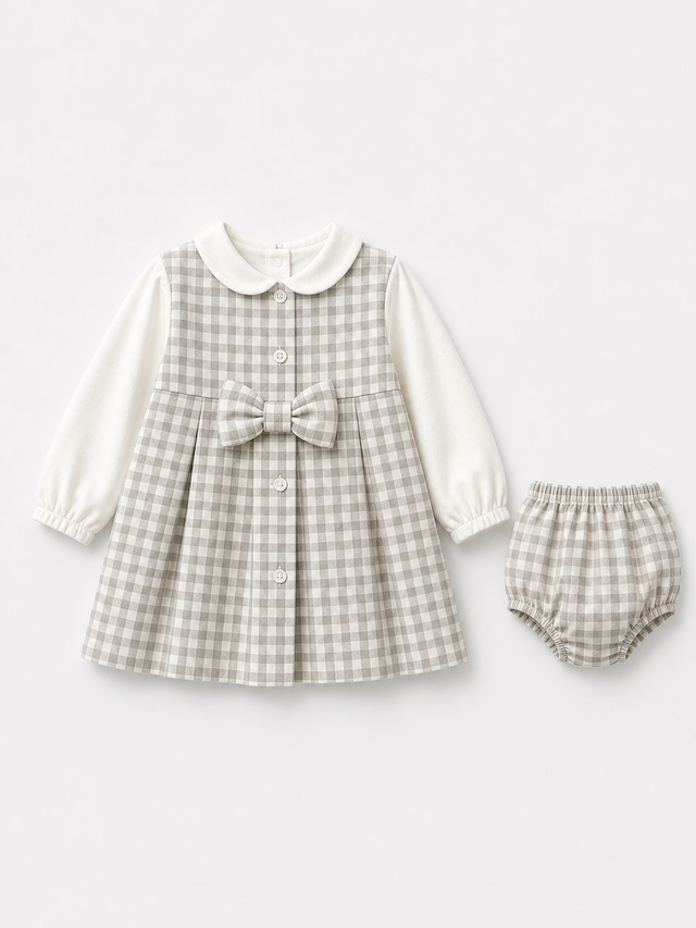 Baby wearing Anaario Grey Blush Tiered grey with pink and white polka dots tiered dress set, newborn to 24 months
