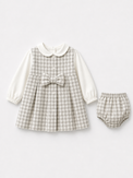 Baby wearing Anaario Grey Blush Tiered grey with pink and white polka dots tiered dress set, newborn to 24 months