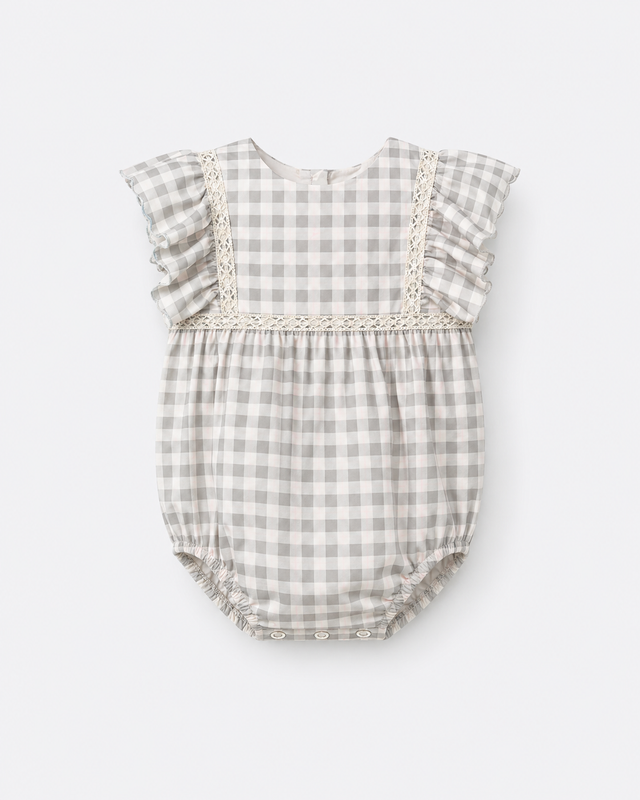 Baby wearing Anaario Grey Gingham Lace Frill Romper with frill sleeves, newborn to 24 months