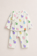 Baby wearing Anaario Colourful Sheep Wrap ivory base co-ord set, newborn to 24 months