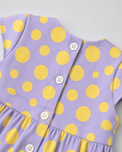 Baby wearing Anaario Lavender Dot Bow lavender with soft yellow polka dots dress set, newborn to 24 months