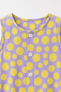 Baby wearing Anaario Lavender Yellow Polka Dot Button sleeveless romper, newborn to 24 months