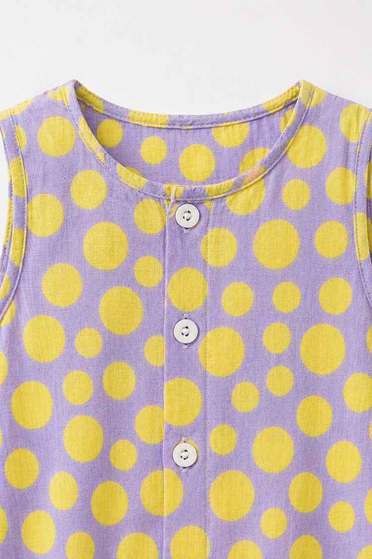 Baby wearing Anaario Lavender Yellow Polka Dot Button sleeveless romper, newborn to 24 months